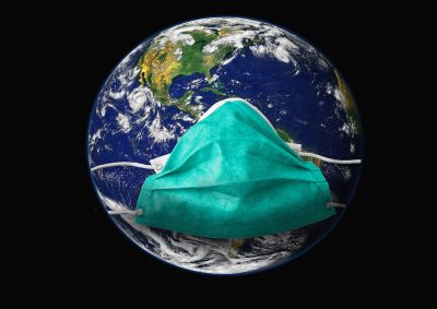 Symbolbild Corona-Pandemie: Erde mit Atemschutzmaske